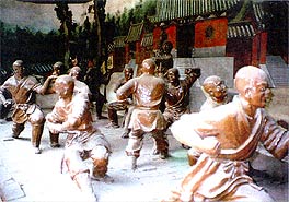 DA HONG QUAN is one of the most important parts of Shaolin training. The picture shows the gallery of wooden sculptures at the Shaolin monastery. Monks are in the process of improving techniques of DA HONG QUAN.
